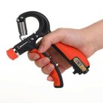 Hand grip réglable 5-60Kg avec compteur orange