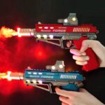 Pistolet musical avec canon télescopique vibrant et à fumée