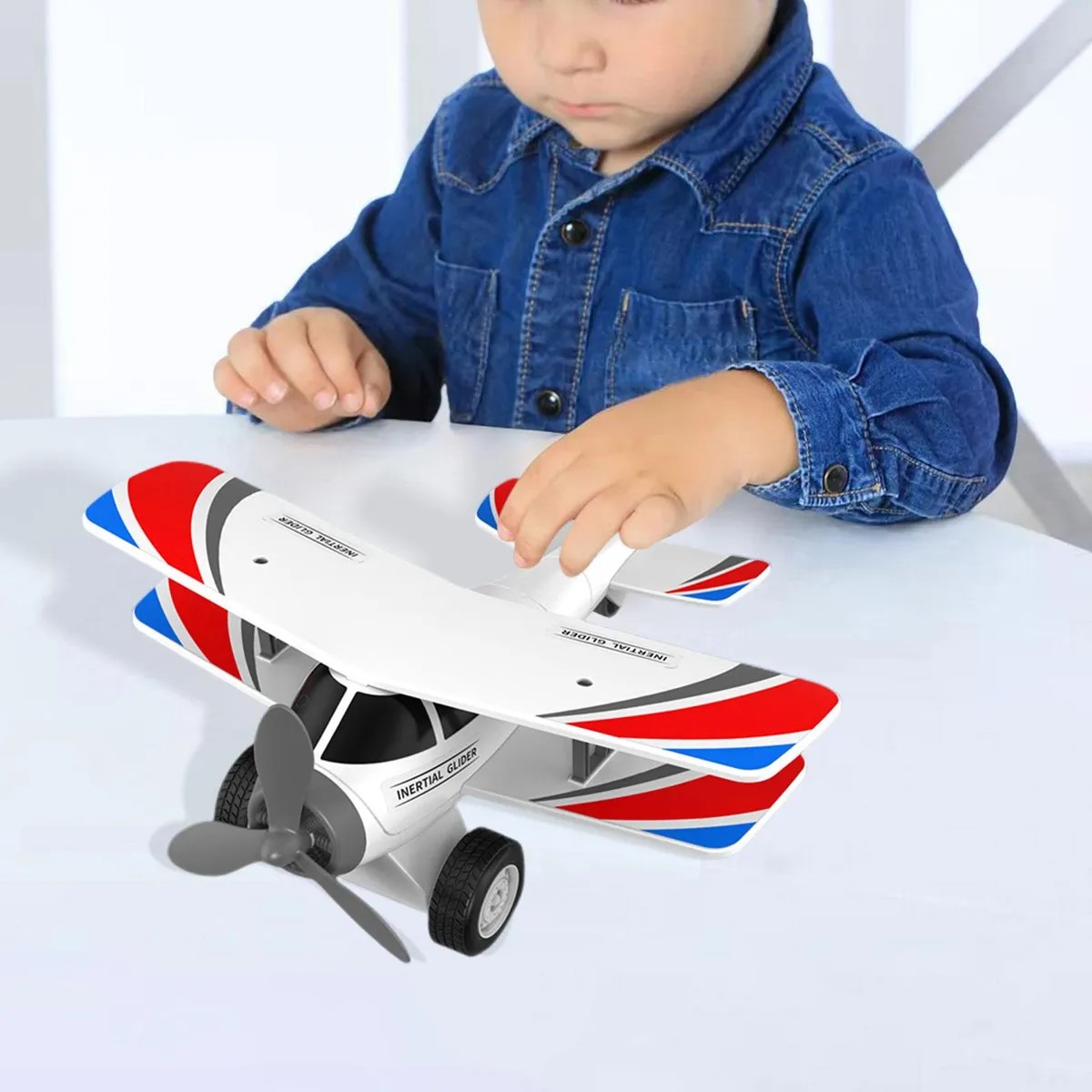 Jouet-enfants-biplan-garçon-anniversaire-jouet-cadeau-promodeal-tunisie-9 Avion jouet à manivelle pour enfant – Image 1